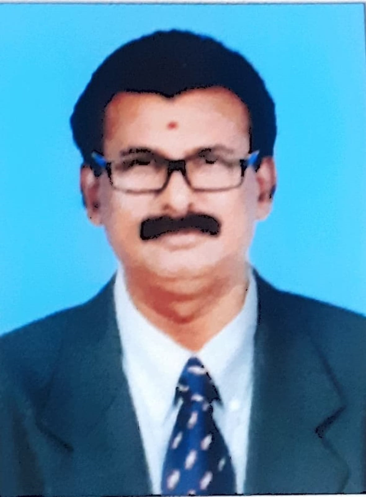 Dr. RAMARAJ E